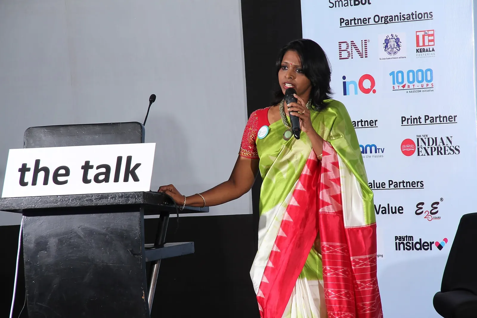 Dr. CeeVee delivering a keynote at The Talk in Kochi
